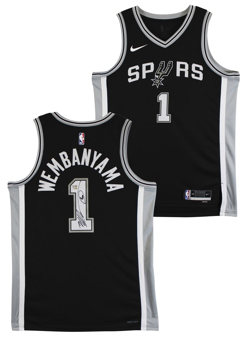 Victor Wembanyama Signed Black Nike Icon Jersey with Alien Sketch: Victor Wembanyama Signed Black Nike Icon Jersey with Alien Sketch This black Nike Icon Edition jersey features a unique alien sketch and has been personally signed by Victor Wembanyama of the San Anto