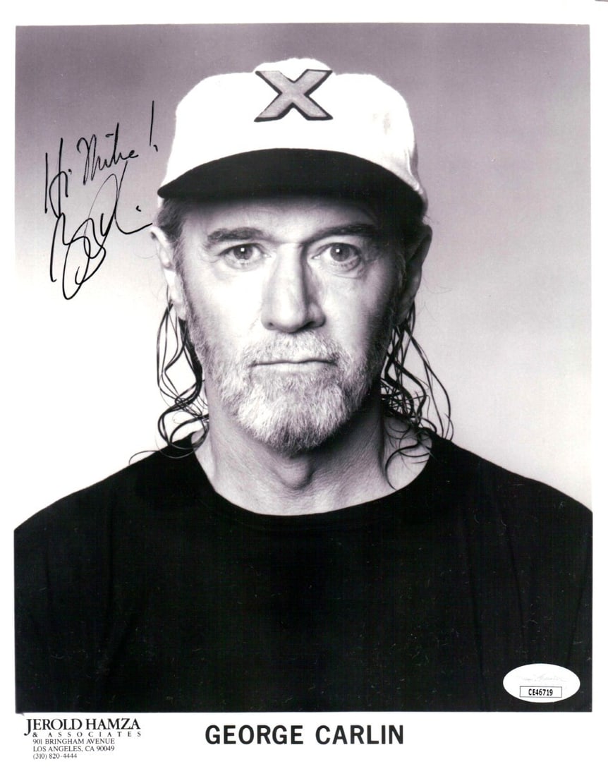 George Carlin Signed 8X10 Photo JSA Authenticated Vintage Promo: George Carlin Signed 8X10 Photo JSA Authenticated Vintage Promo This is a vintage 8x10 promotional headshot photograph of the legendary comedian George Carlin, featuring his authentic signature. The p