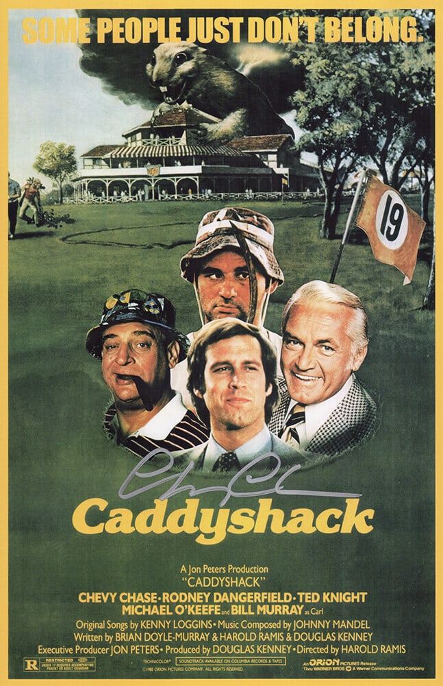 Chevy Chase Signed Caddyshack 11x17 Poster with COA: Chevy Chase Signed Caddyshack 11x17 Poster with COA This is an original 11x17 movie poster of 'Caddyshack' featuring the autograph of Chevy Chase, signed in silver ink. The item includes a tamper-proo