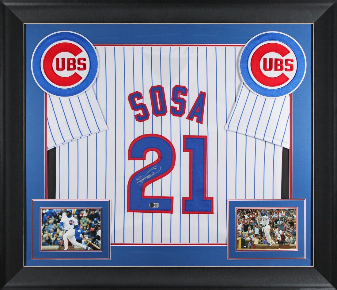 Sammy Sosa Signed Framed White Pinstripe Jersey Chicago Cubs BAS Authenticated: Sammy Sosa Signed Framed White Pinstripe Jersey Chicago Cubs BAS Authenticated This Authentic Signed White Pinstripe Pro Style Framed Jersey has been personally signed by the legendary Sammy Sosa of t