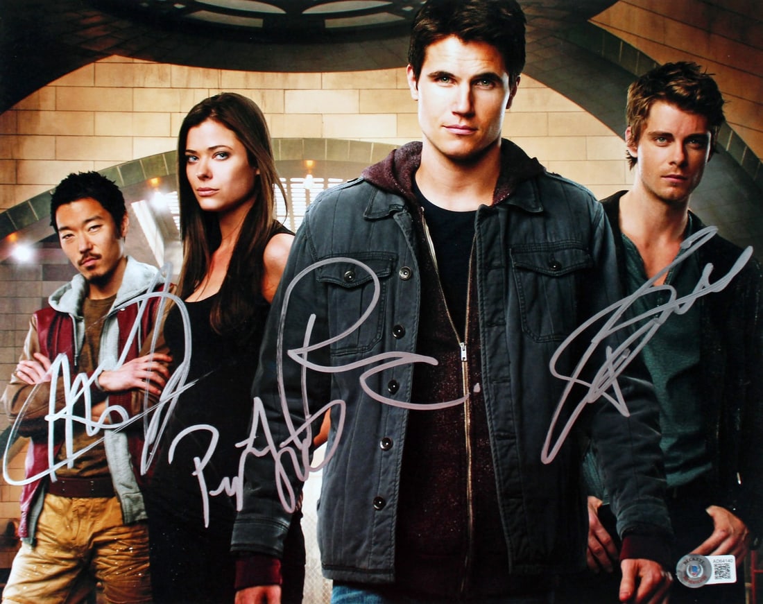 Tomorrow People Signed 11x14 Photo by Amell List Yoo Mitchell BAS COA: Tomorrow People Signed 11x14 Photo by Amell List Yoo Mitchell BAS COA This stunning 11x14 photograph features the signatures of Robbie Amell, Peyton List, Aaron Yoo, and Luke Mitchell, all stars of th