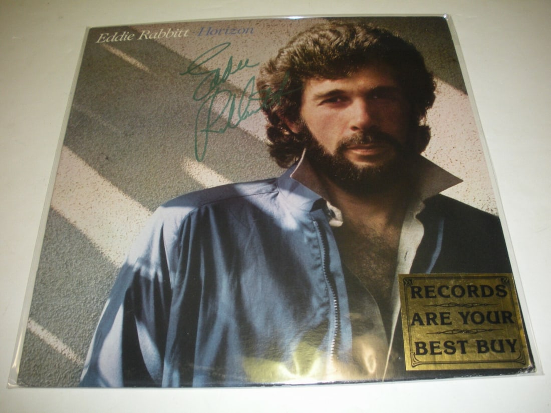 Eddie Rabbitt Horizon Signed LP with Certificate of Authenticity: Eddie Rabbitt Horizon Signed LP with Certificate of Authenticity This is an original signed LP record album by Eddie Rabbitt, featuring his iconic work "Horizon." The album comes with a Certificate of