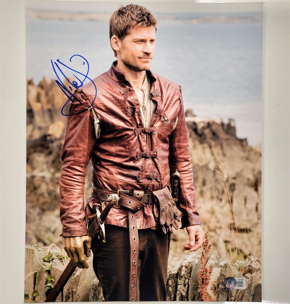 Nikolaj Coster-Waldau Game of Thrones 11x14 Signed Photo Beckett Authenticated: Nikolaj Coster-Waldau Game of Thrones 11x14 Signed Photo Beckett Authenticated This is a striking 11x14 photograph from the acclaimed series Game of Thrones, featuring the signature of Nikolaj Coster-