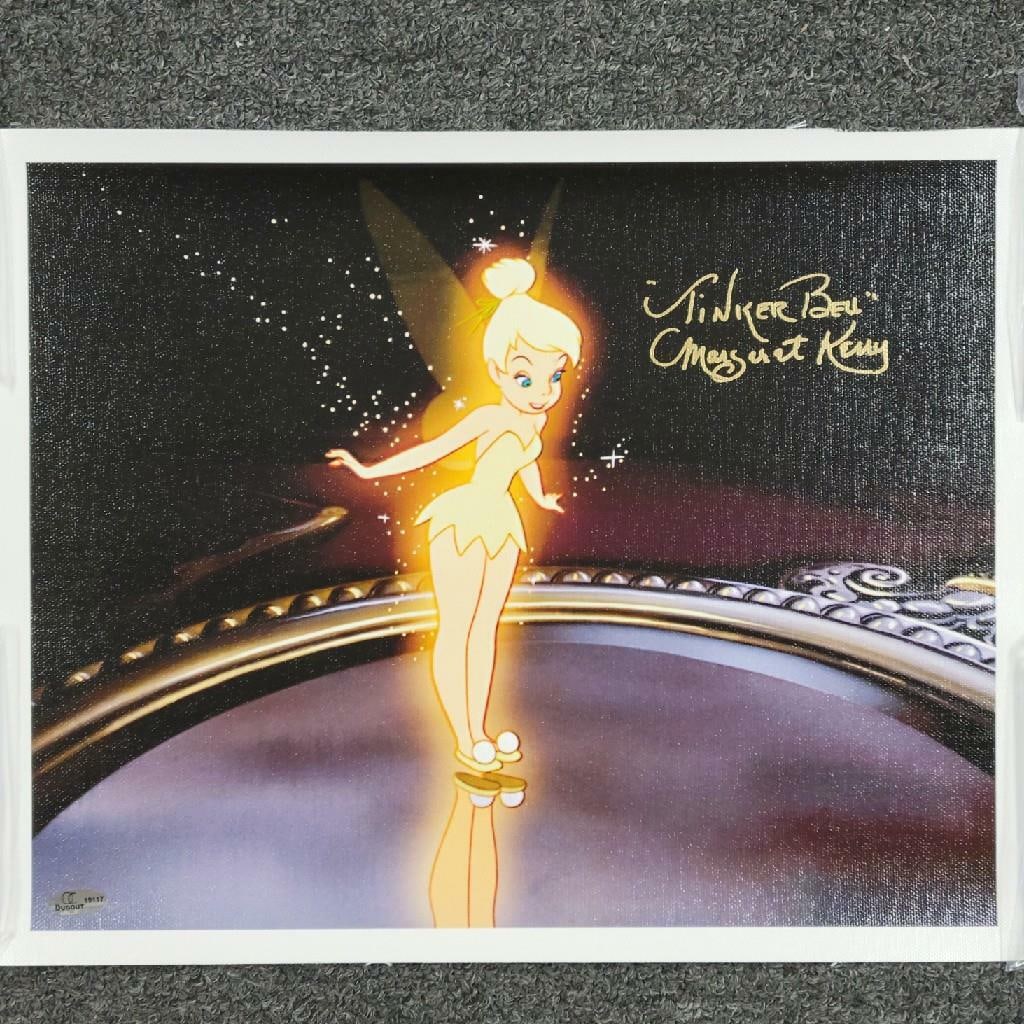 11x14 Canvas Photo Signed by Margaret Kerry as Tinker Bell Beckett Authenticated: 11x14 Canvas Photo Signed by Margaret Kerry as Tinker Bell Beckett Authenticated This original 11x14 canvas photograph features a signature by Margaret Kerry, known as the reference model for Tinker B