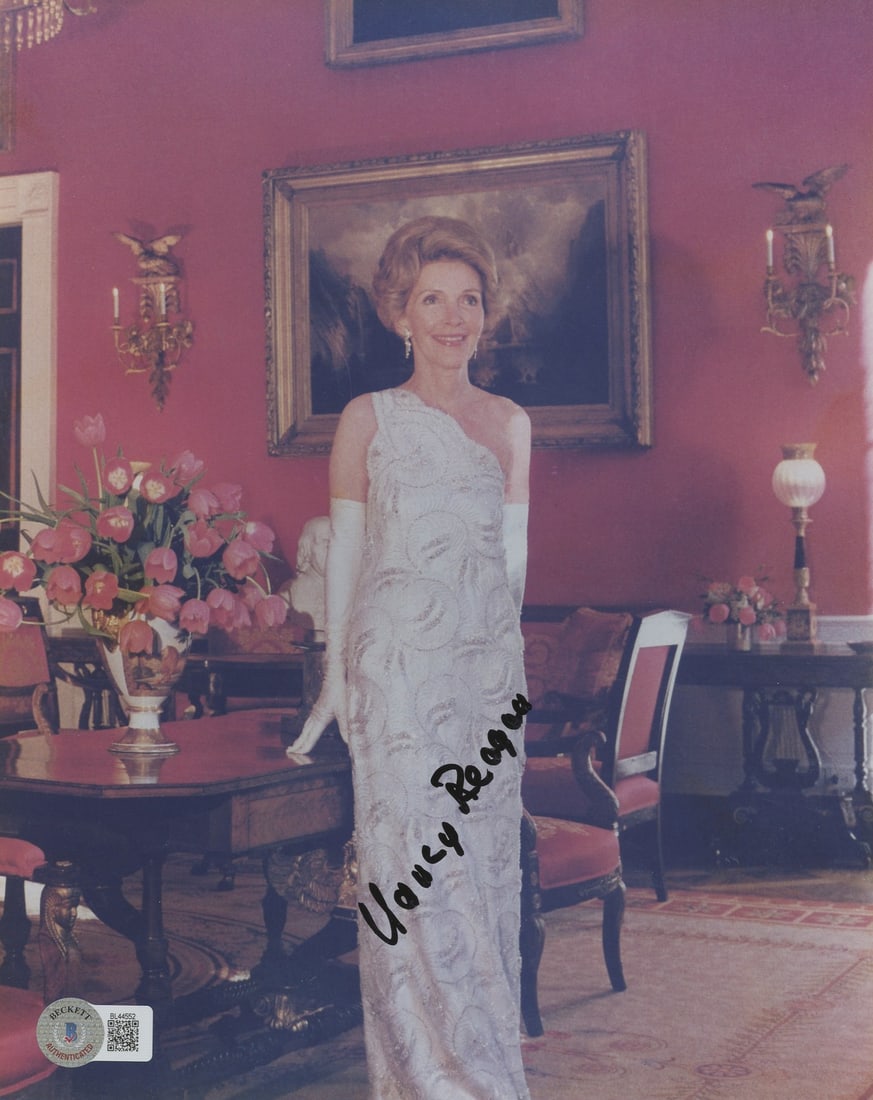 Nancy Reagan Signed Hellcats of the Navy 8x10 Photo BAS Authenticated: Nancy Reagan Signed Hellcats of the Navy 8x10 Photo BAS Authenticated This authentic 8x10 photograph features the signature of Nancy Reagan, known for her role in the film Hellcats of the Navy. The ph