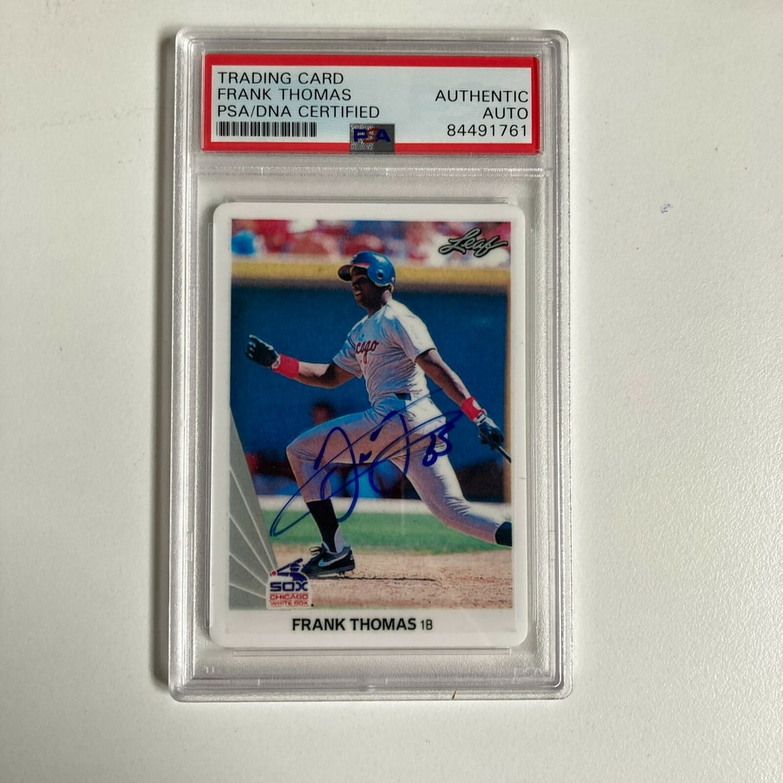 1990 Leaf Frank Thomas Rookie Signed Porcelain Card PSA Authenticated: 1990 Leaf Frank Thomas Rookie Signed Porcelain Card PSA Authenticated This is a 1990 Leaf Frank Thomas Rookie Card, featuring a hard-signed autograph. Authenticated by Professional Sports Authenticato