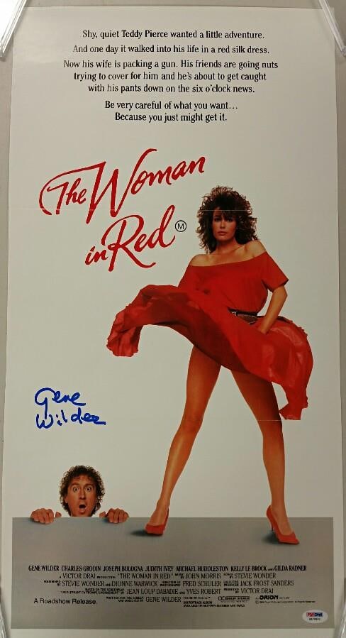 Original The Woman in Red 13x25 Poster Signed by Gene Wilder PSA/DNA: Original The Woman in Red 13x25 Poster Signed by Gene Wilder PSA/DNA This is an original 13x25 inch movie poster for "The Woman in Red," hand-signed by Gene Wilder. The autograph is authenticated by P