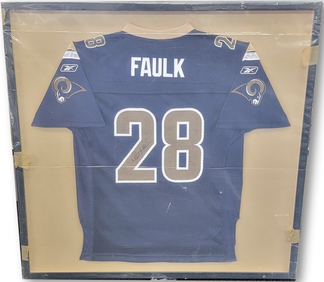 Marshall Faulk Autographed Jersey Custom Framed Los Angeles Rams 32 x 33: Marshall Faulk Autographed Jersey Custom Framed Los Angeles Rams 32 x 33 Celebrate the legacy of Marshall Faulk with this custom framed autographed jersey from the Los Angeles Rams. This original piec
