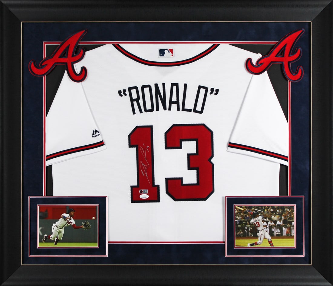 Framed White Jersey Signed by Ronald Acuna Jr JSA Authenticated: Framed White Jersey Signed by Ronald Acuna Jr JSA Authenticated This professionally framed white Majestic jersey features the authentic hand-signed autograph of Ronald Acuna Jr. from the Atlanta Brave
