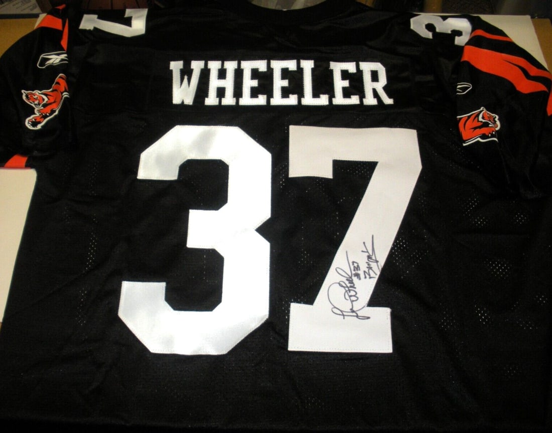 Leonard Wheeler Signed Cincinnati Bengals Reebok Jersey with COA: Leonard Wheeler Signed Cincinnati Bengals Reebok Jersey with COA This official licensed Reebok jersey features Leonard Wheeler of the Cincinnati Bengals, perfect for any football fan or collector. The