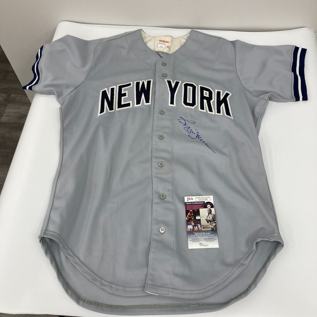Reggie Jackson Signed 1970's Yankees Jersey with JSA COA: Reggie Jackson Signed 1970's Yankees Jersey with JSA COA This is an original 1970's vintage Wilson jersey from the New York Yankees, signed by Reggie Jackson, a legendary baseball player. The jersey i