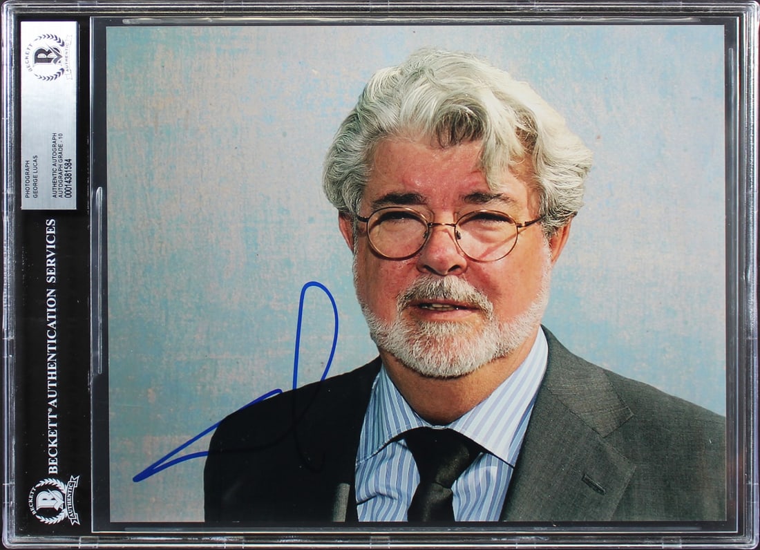 George Lucas Signed Star Wars 8x10 Photo Gem Mint 10 BAS Authenticated: George Lucas Signed Star Wars 8x10 Photo Gem Mint 10 BAS Authenticated This authentic 8x10 photograph features the signature of George Lucas, the iconic creator of Star Wars. Graded Gem Mint 10, this