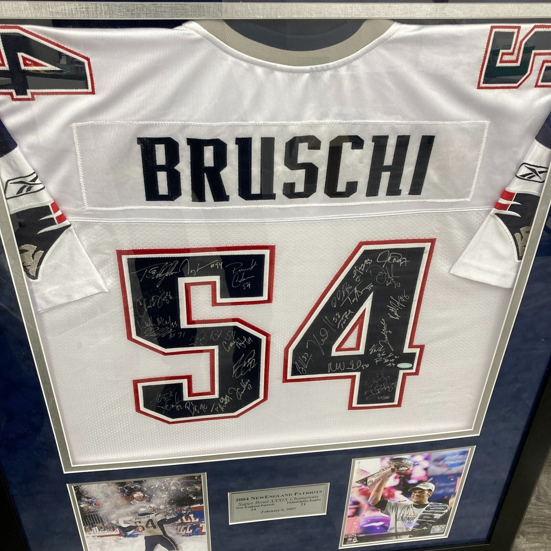 Tom Brady 2004 New England Patriots Signed Jersey with Steiner COA: Tom Brady 2004 New England Patriots Signed Jersey with Steiner COA Celebrate the legacy of Tom Brady with this original team-signed jersey from the 2004 New England Patriots Super Bowl Champions. This