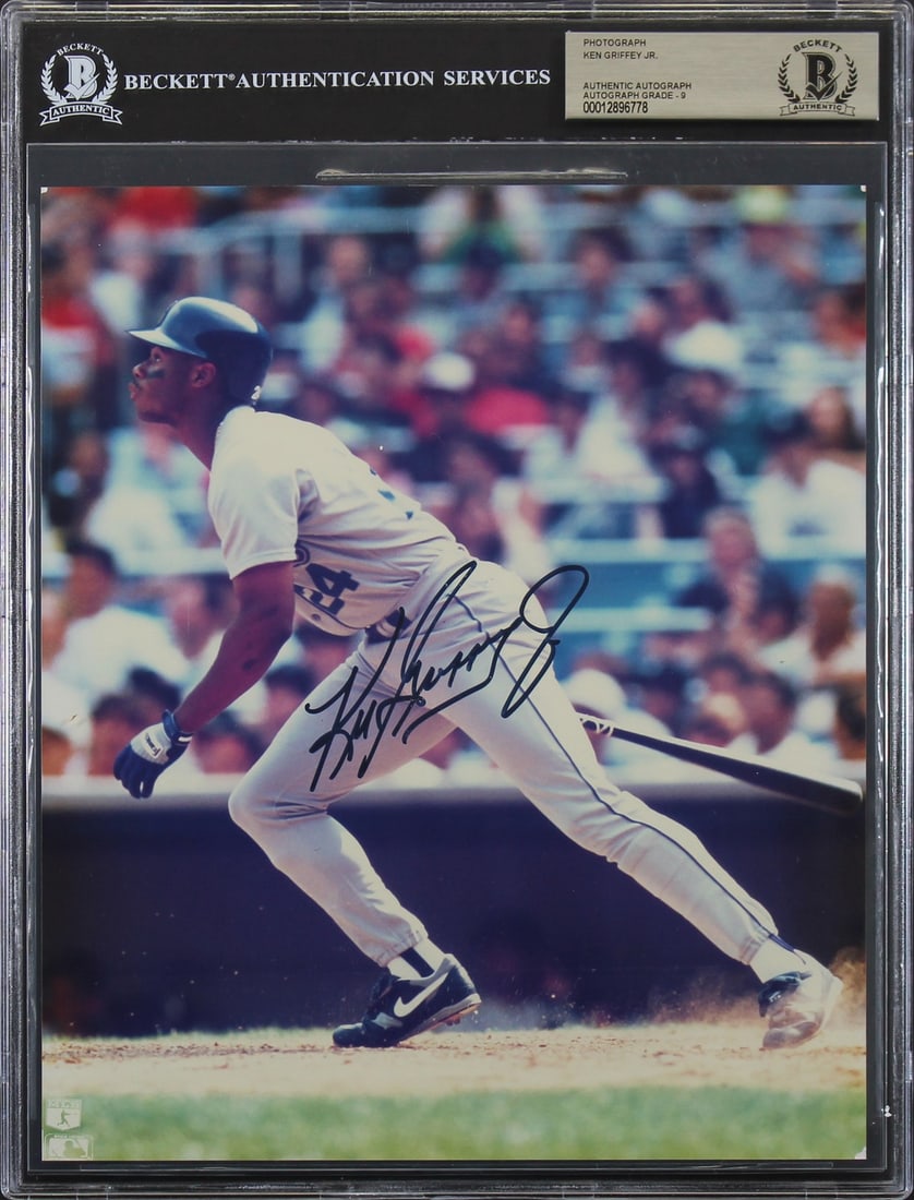 Ken Griffey Jr. Signed Seattle Mariners 8x10 Photo Beckett 9 Auto Slabbed: Ken Griffey Jr. Signed Seattle Mariners 8x10 Photo Beckett 9 Auto Slabbed This is an original 8x10 photo that has been personally signed by Ken Griffey Jr. of the Seattle Mariners. The autograph has b