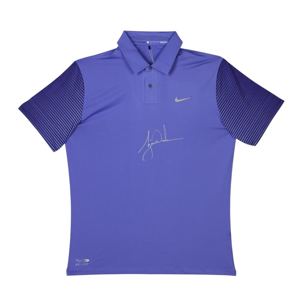Limited Edition Tiger Woods Autographed Nike Polo Shirt #/25: Limited Edition Tiger Woods Autographed Nike Polo Shirt #/25 This exclusive Nike Purple Haze Polo Shirt is autographed by golf legend Tiger Woods, making it a must-have for any serious collector. This