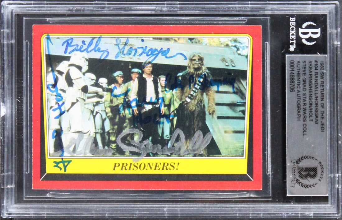 1983 Star Wars ROTJ #104 Card Signed by 5 Beckett Authenticated: 1983 Star Wars ROTJ #104 Card Signed by 5 Beckett Authenticated This is a signed 1983 Star Wars Return of the Jedi #104 trading card, featuring the autographs of Mike Randall, Billy Horrigan, Colin Sk
