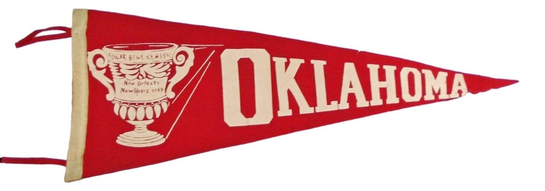 Vintage 1949 Oklahoma Sooners Sugar Bowl Official Pennant: Vintage 1949 Oklahoma Sooners Sugar Bowl Official Pennant This vintage 30" pennant celebrates the Oklahoma Sooners' participation in the 1949 Sugar Bowl. An officially licensed piece, it represents a