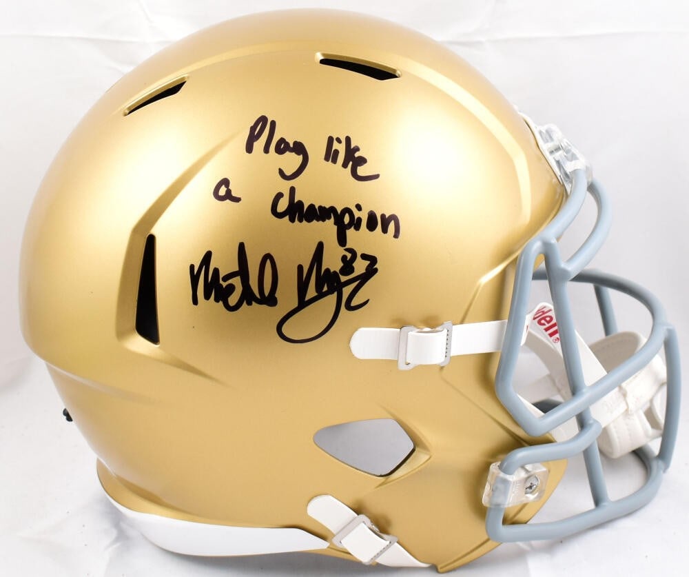 Michael Mayer Signed Notre Dame Speed Helmet Beckett Authenticated: Michael Mayer Signed Notre Dame Speed Helmet Beckett Authenticated This is an original full-size speed helmet signed by Michael Mayer, featuring the iconic "Play Like a Champ" inscription. The helmet