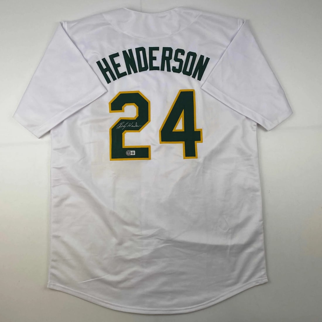 Rickey Henderson Autographed Oakland Athletics Jersey Beckett COA: Rickey Henderson Autographed Oakland Athletics Jersey Beckett COA Celebrate the legendary career of Rickey Henderson with this autographed Oakland Athletics white jersey. This original custom jersey f