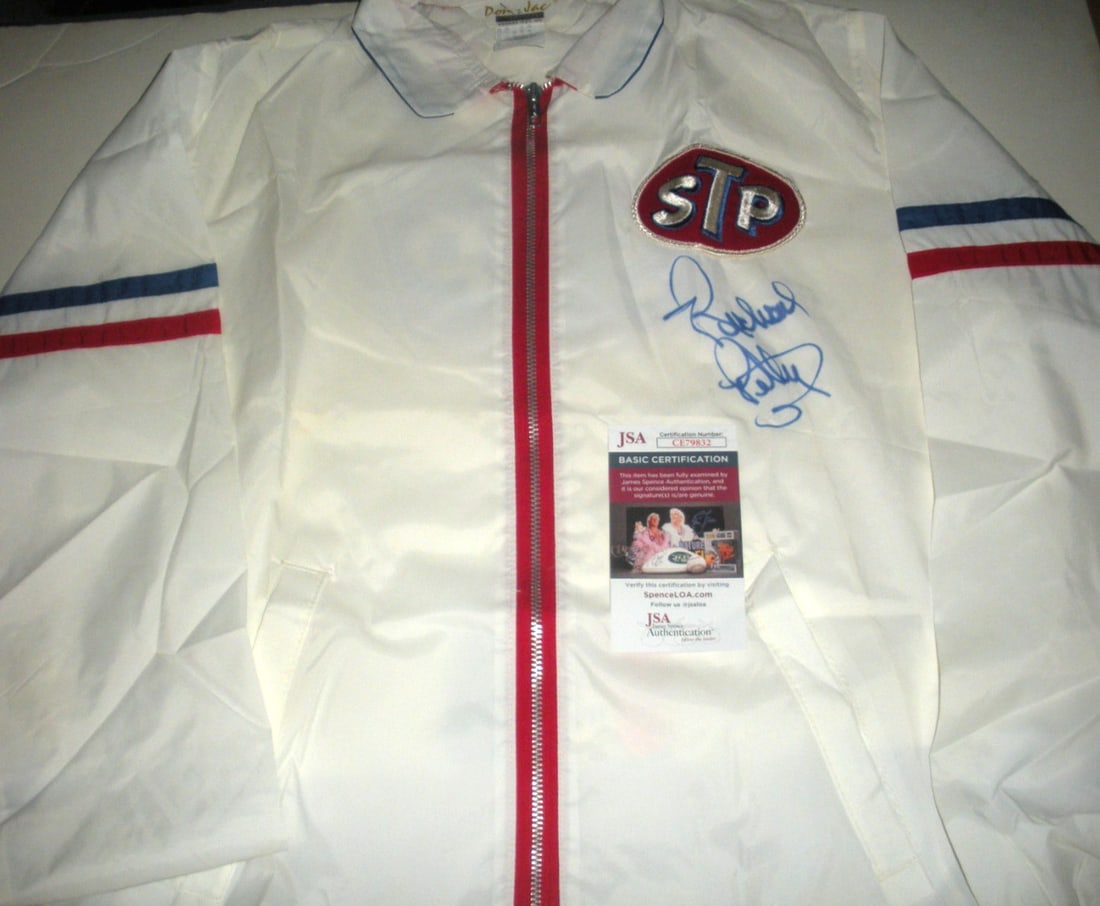Richard Petty Signed NASCAR Racing Jacket with JSA COA: Richard Petty Signed NASCAR Racing Jacket with JSA COA This Richard Petty NASCAR racing jacket is a must-have for fans of the legendary driver, known as 'The King.' This original, pre-owned jacket is