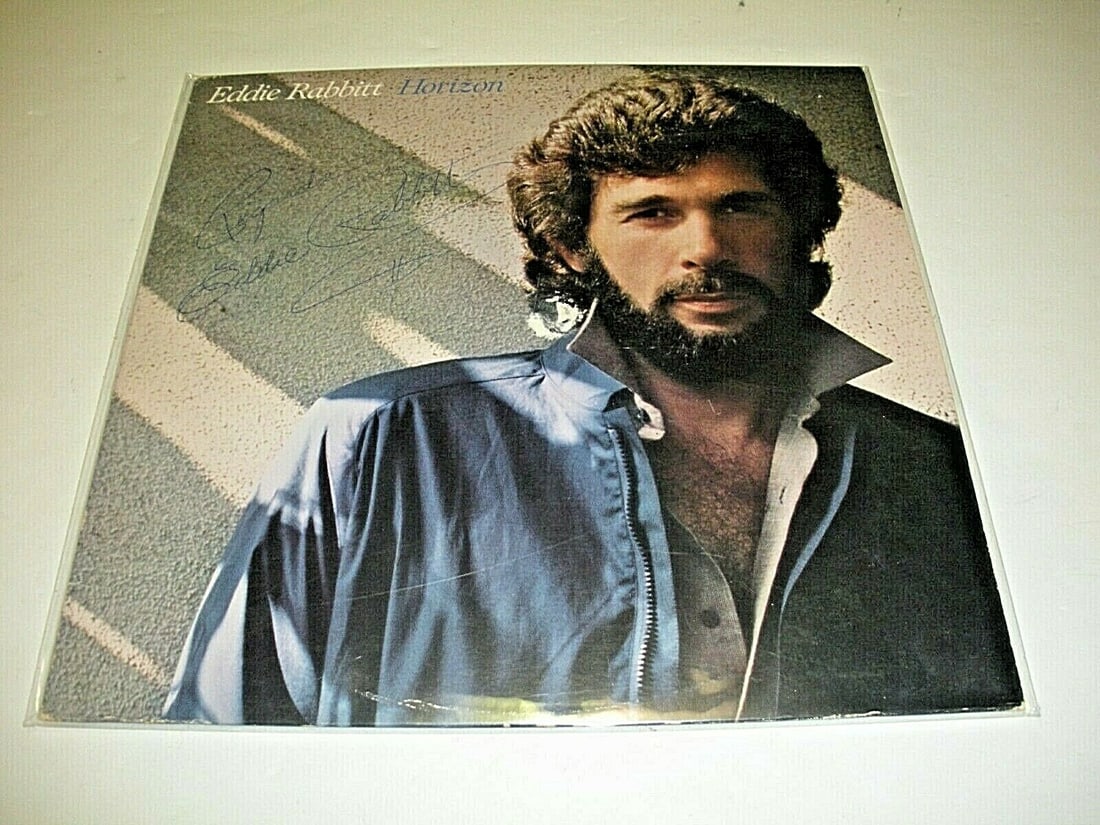Eddie Rabbitt Horizon Signed LP Record with COA: Eddie Rabbitt Horizon Signed LP Record with COA This is an original signed LP record album by Eddie Rabbitt, featuring the title "Horizon." The album comes with a Certificate of Authenticity (COA) ver