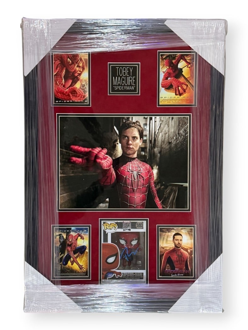 Tobey Maguire Signed Funko Pop Spiderman Custom Frame Beckett Authenticated: Tobey Maguire Signed Funko Pop Spiderman Custom Frame Beckett Authenticated This Tobey Maguire Signed Autographed Funko Pop of Spider-Man is a must-have collectible for fans. The item is custom framed