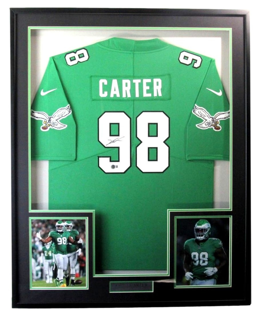 Jalen Carter Autographed Framed Eagles Jersey Beckett Authenticated 33x42: Jalen Carter Autographed Framed Eagles Jersey Beckett Authenticated 33x42 This is a Jalen Carter Signed Philadelphia Eagles Football Jersey in striking Kelly Green, beautifully framed for display. The