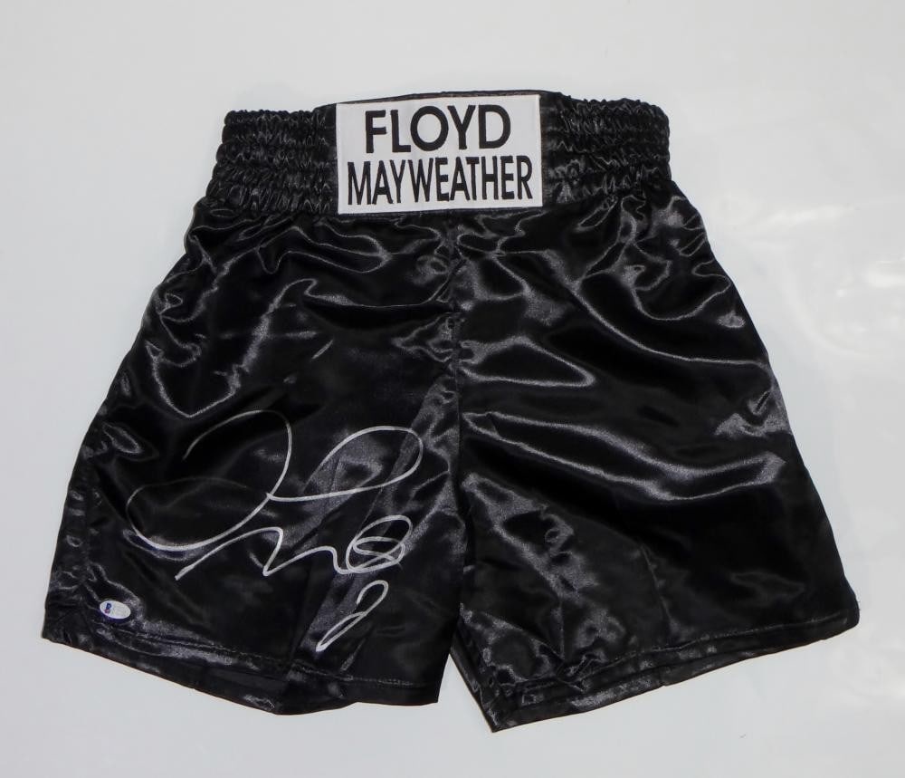 Boxing Memorabilia Black Trunks Signed by Floyd Mayweather Beckett Authenticated: Boxing Memorabilia Black Trunks Signed by Floyd Mayweather Beckett Authenticated These black custom trunks have been autographed by Floyd Mayweather. The item is an original piece and is