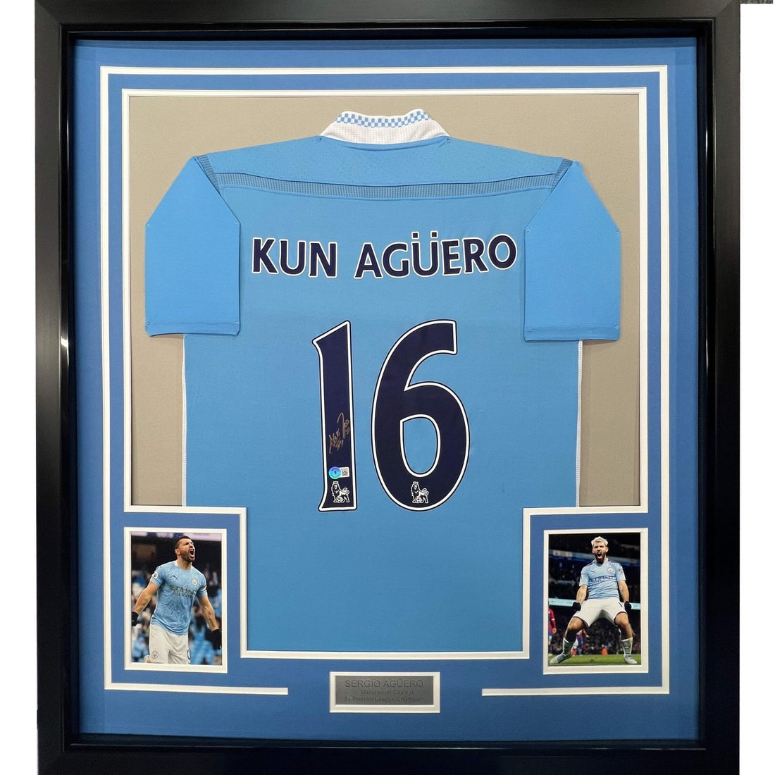 Framed Signed Sergio Aguero Manchester City Jersey BAS COA 33x42: Framed Signed Sergio Aguero Manchester City Jersey BAS COA 33x42 This professionally framed and matted display features a signed Sergio Kun Aguero jersey, perfect for any Manchester City fan. The item