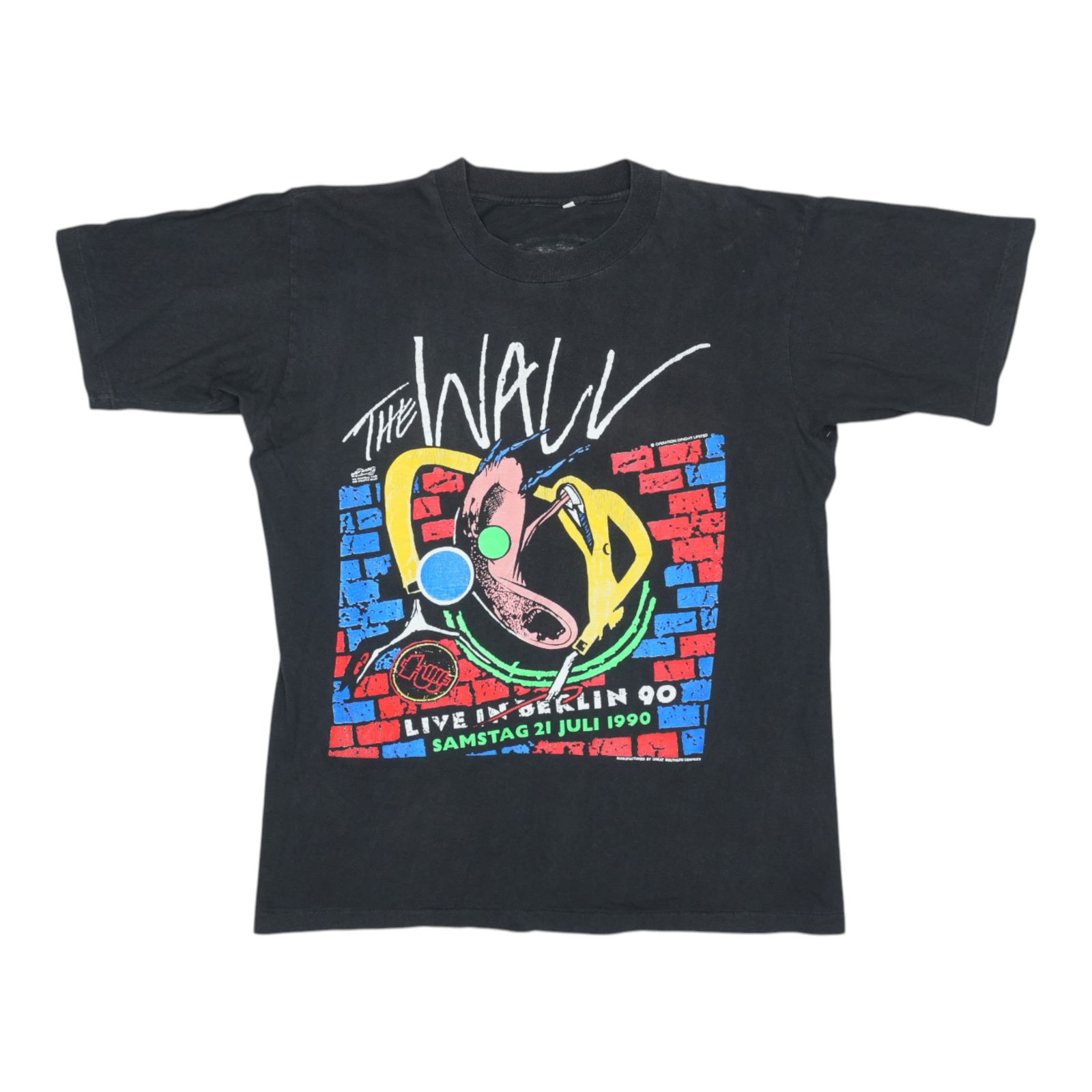 Vintage 1990 Pink Floyd Berlin Concert The Wall Black Cotton Shirt: Vintage 1990 Pink Floyd Berlin Concert The Wall Black Cotton Shirt This is an original vintage 1990 Pink Floyd The Wall Berlin shirt featuring graphic prints on both the front and back. Made from 100%