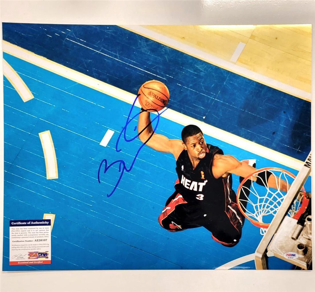 Dwyane Wade Miami Heat 16x20 Photo Signed PSA Authenticated: Dwyane Wade Miami Heat 16x20 Photo Signed PSA Authenticated This is an original 16x20 photo of Dwyane Wade, featuring a prominent autograph authenticated by the Professional Sports Authenticator (PSA)