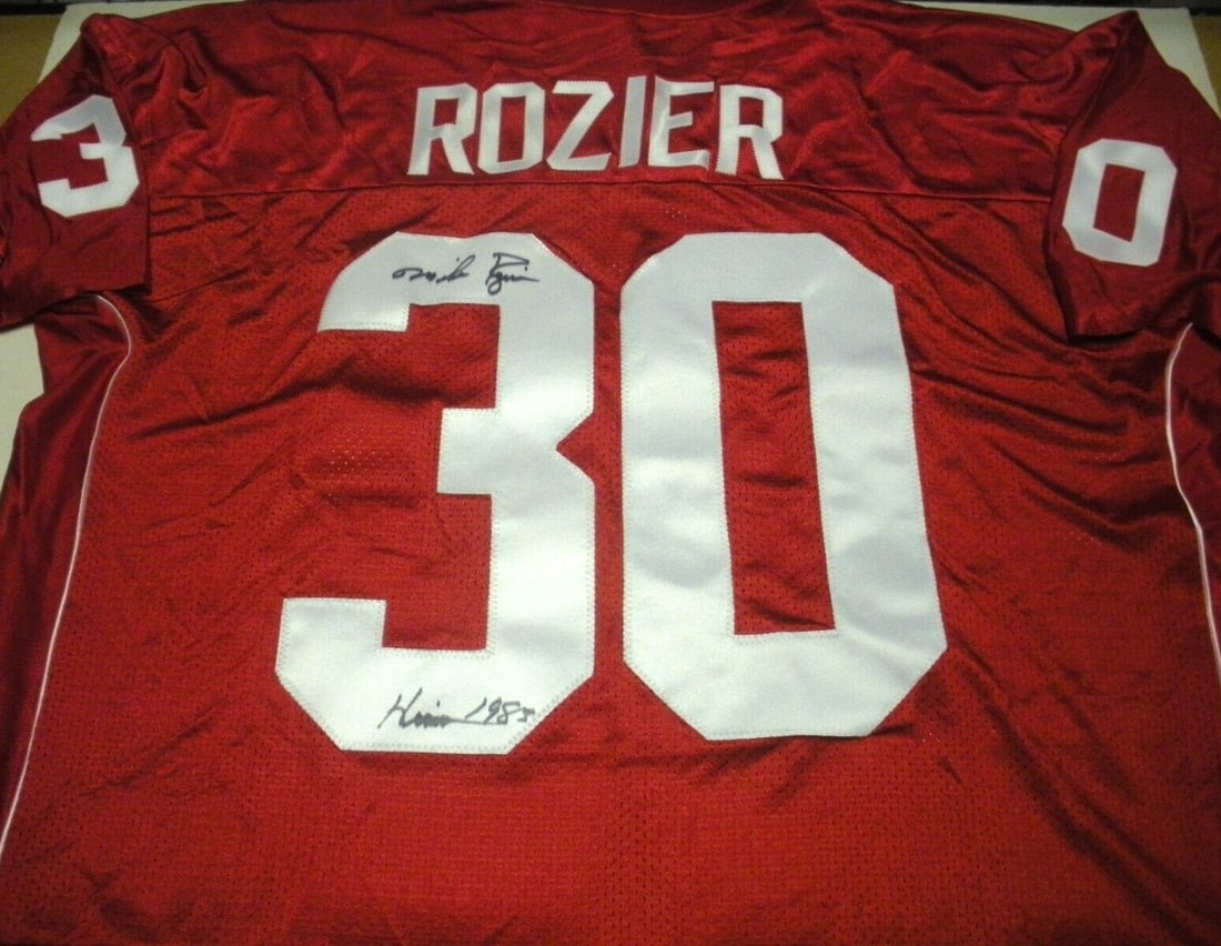 Signed Mike Rozier Nebraska Cornhuskers Adidas Jersey with COA: Signed Mike Rozier Nebraska Cornhuskers Adidas Jersey with COA This officially licensed Adidas jersey features the signature of Mike Rozier, a notable player from the Nebraska Cornhuskers football tea