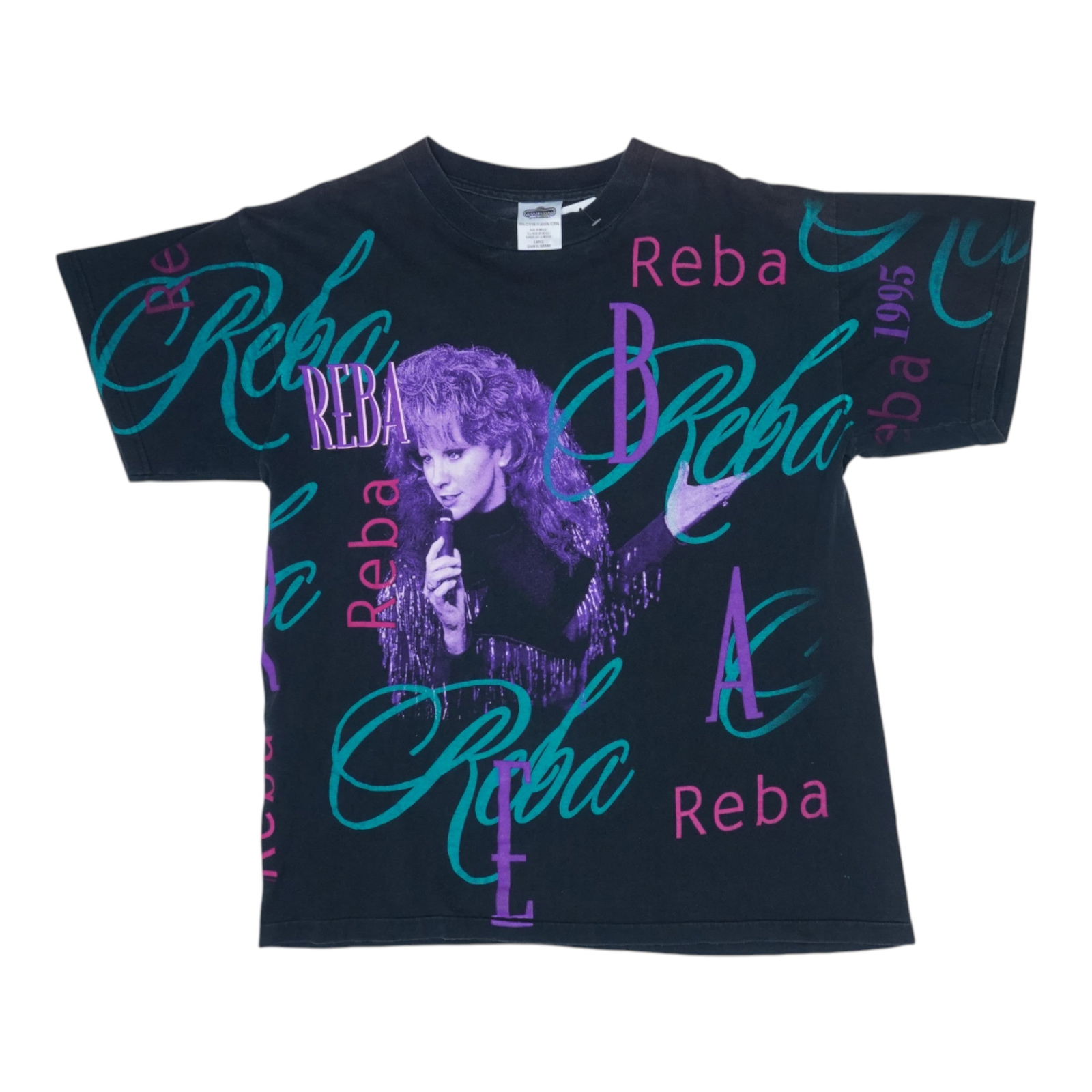 Vintage 1995 Reba McEntire Black Cotton Graphic T Shirt: Vintage 1995 Reba McEntire Black Cotton Graphic T Shirt This is an original vintage 1995 Reba McEntire all over print shirt featuring graphics on both the front and back. The shirt is made of 100% cot