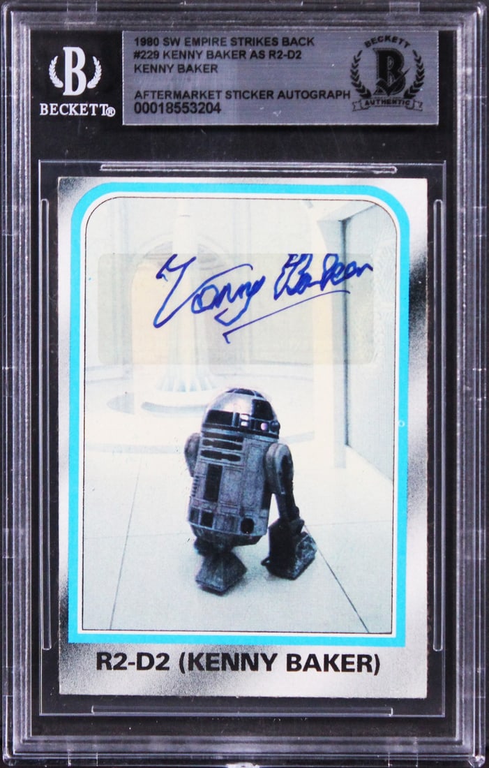 Kenny Baker Star Wars Signed Empire Strikes Back Card BAS Slabbed: Kenny Baker Star Wars Signed Empire Strikes Back Card BAS Slabbed This collectible card features the authentic autograph of Kenny Baker, the beloved actor known for his role in the Star Wars franchise