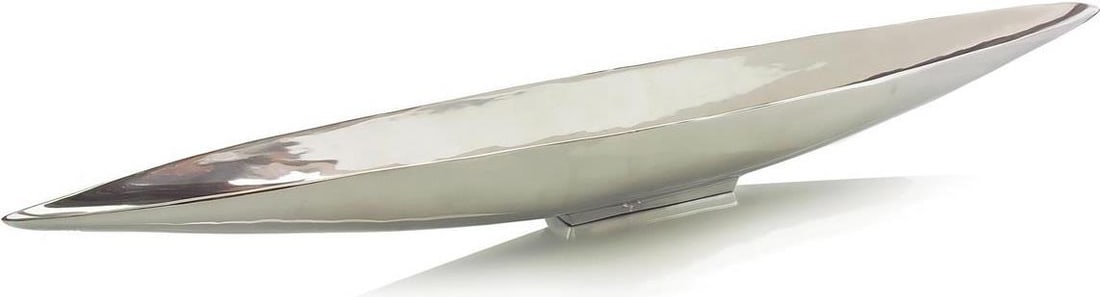 John-Richard Long Boat-Shaped Polished Aluminum Vase 51.5": John-Richard Long Boat-Shaped Polished Aluminum Vase 51.5" This elegant long vase features a stunning polished aluminum finish, making it a striking centerpiece for any space. The unique boat-shaped d