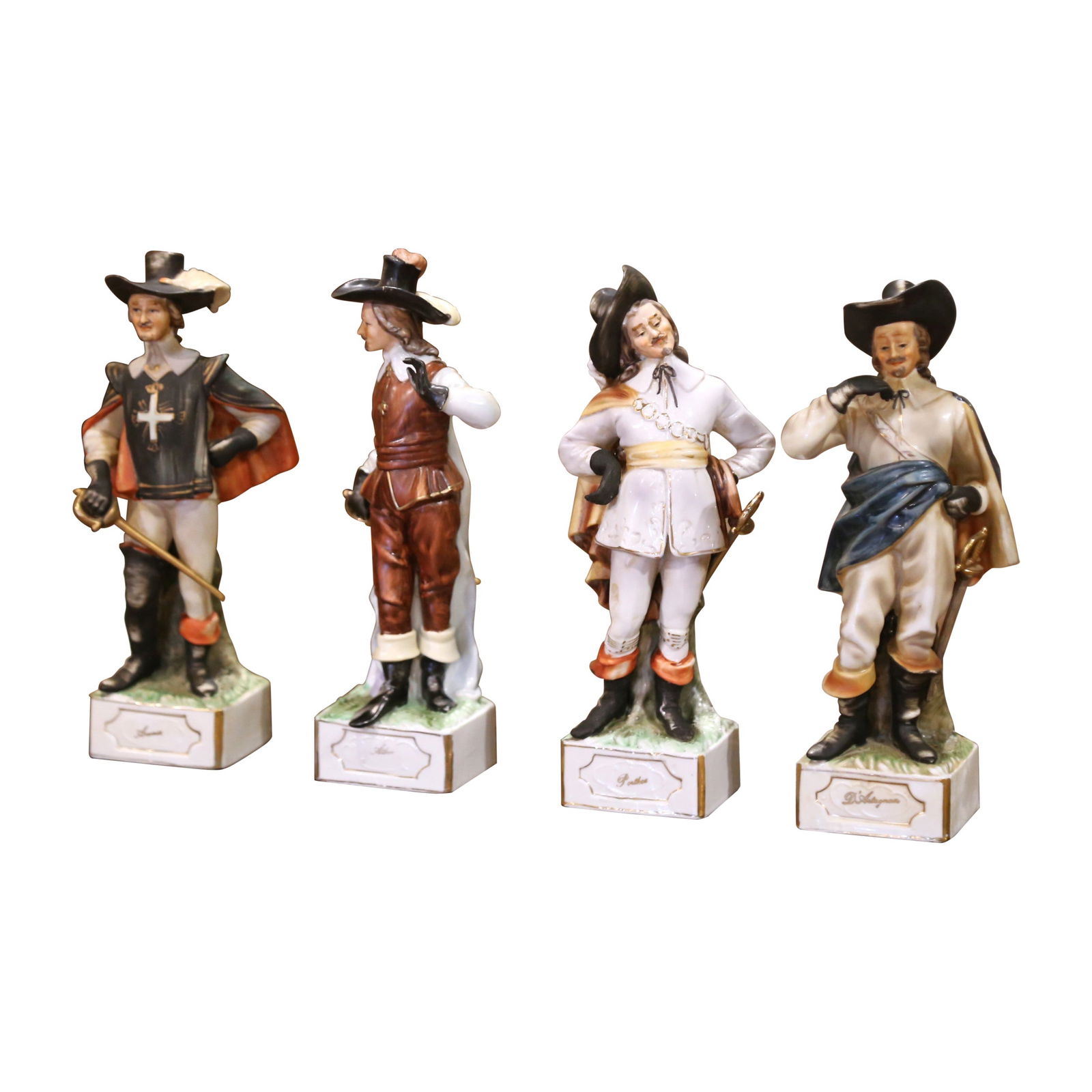 Set of 4 French Porcelain Musketeer Figurines Circa 1960: Set of 4 French Porcelain Musketeer Figurines Circa 1960 This mid-century set features four hand-painted French porcelain figurines representing the iconic characters D'Artagnan, Athos, Porthos, and A