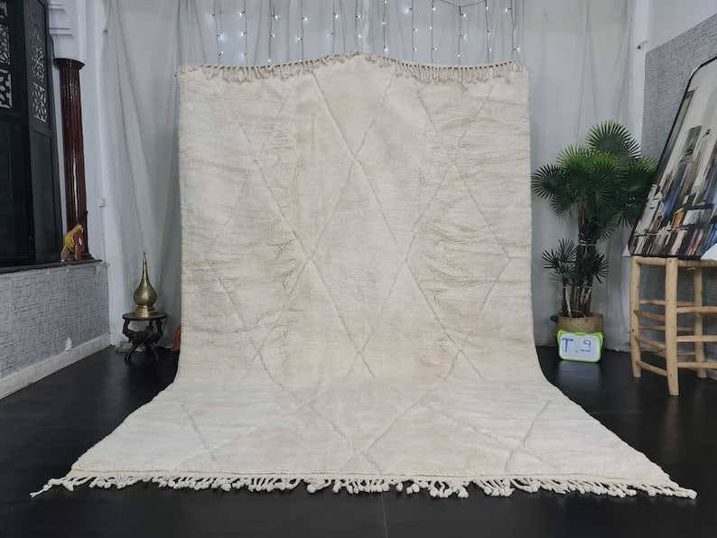 Handwoven White Geometric Engraved Rug 100% Sheep Wool Morocco 9.84 x 6.56 Feet: Handwoven White Geometric Engraved Rug 100% Sheep Wool Morocco 9.84 x 6.56 Feet Discover the exquisite beauty of this Fabulous White Soft Rug, featuring a stunning geometric engraved pattern. Handwove