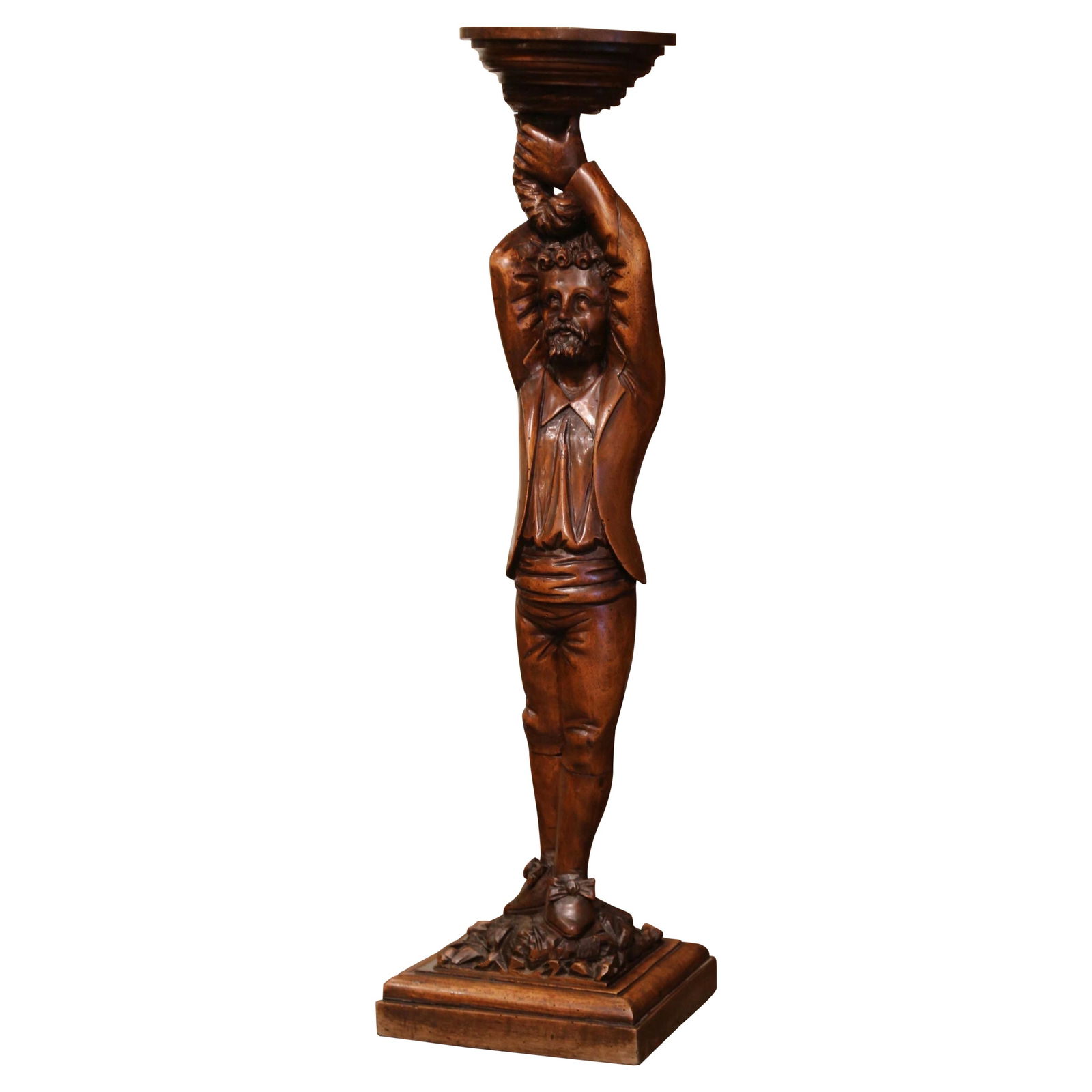 19th Century French Hand-Carved Walnut Pedestal with Gentleman Figure: 19th Century French Hand-Carved Walnut Pedestal with Gentleman Figure This exquisite 19th Century French sellette pedestal is a stunning example of hand-carved craftsmanship. Standing at a height of 4