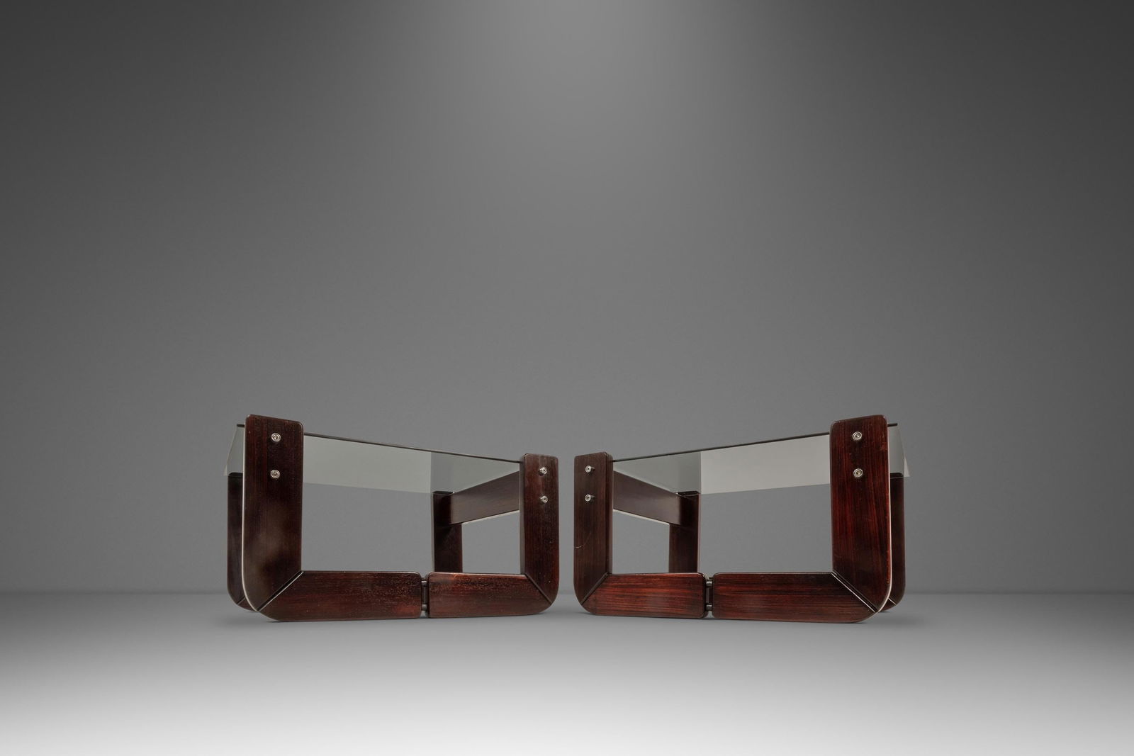 Mid-Century Modern Brutalist End Tables by Percival Lafer Set of 2 Jacaranda Smoked Glass Tops: Mid-Century Modern Brutalist End Tables by Percival Lafer Set of 2 Jacaranda Smoked Glass Tops Brazil 1970s This exquisite set of two Mid-Century Modern Brutalist end tables, crafted by renowned Brazi