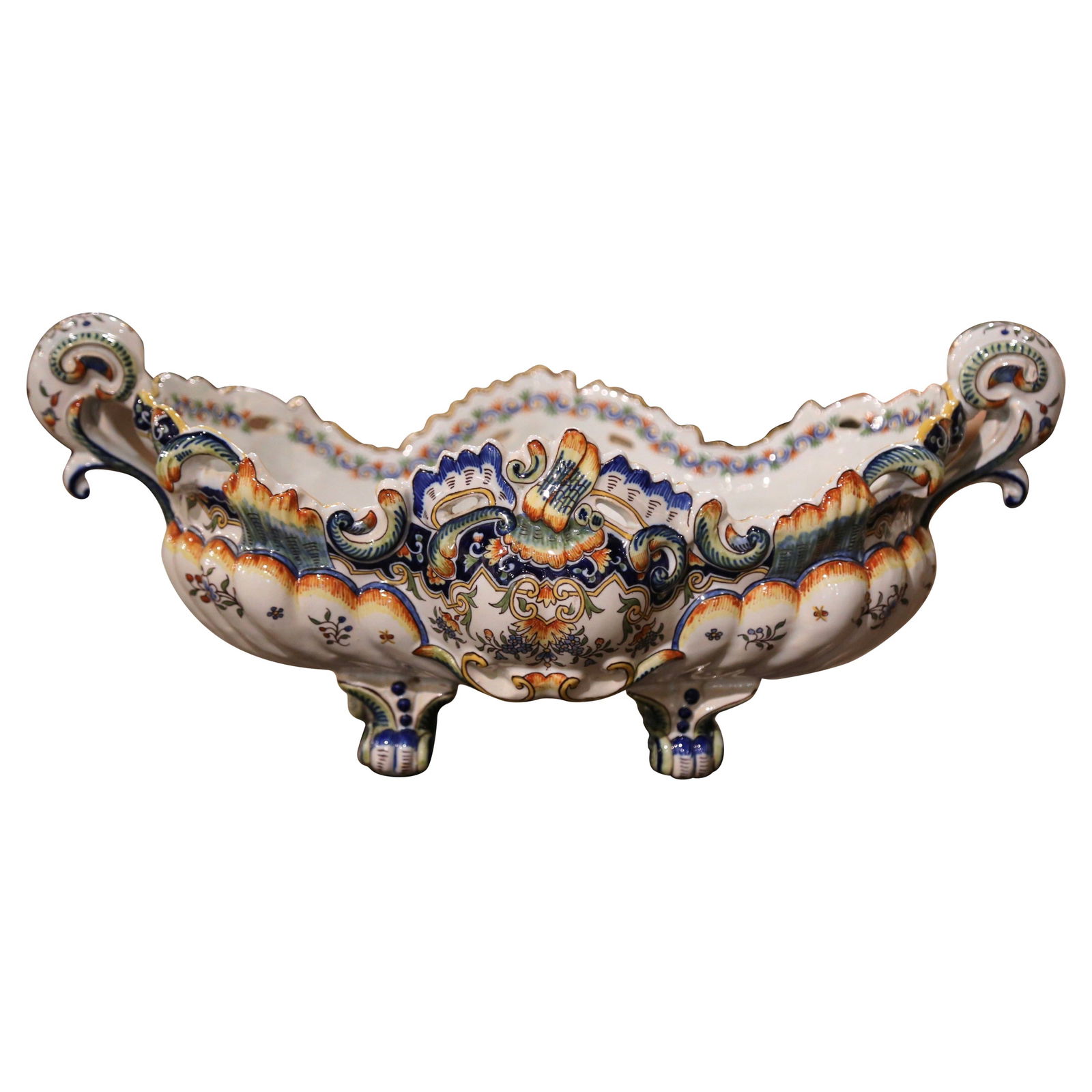 French Oval Faience Planter with Hand Painted Louis XV Floral Motifs Rouen: French Oval Faience Planter with Hand Painted Louis XV Floral Motifs Rouen This mid-century French Louis XV style oval jardiniere was crafted in Rouen, France around 1940. Made from hand-painted