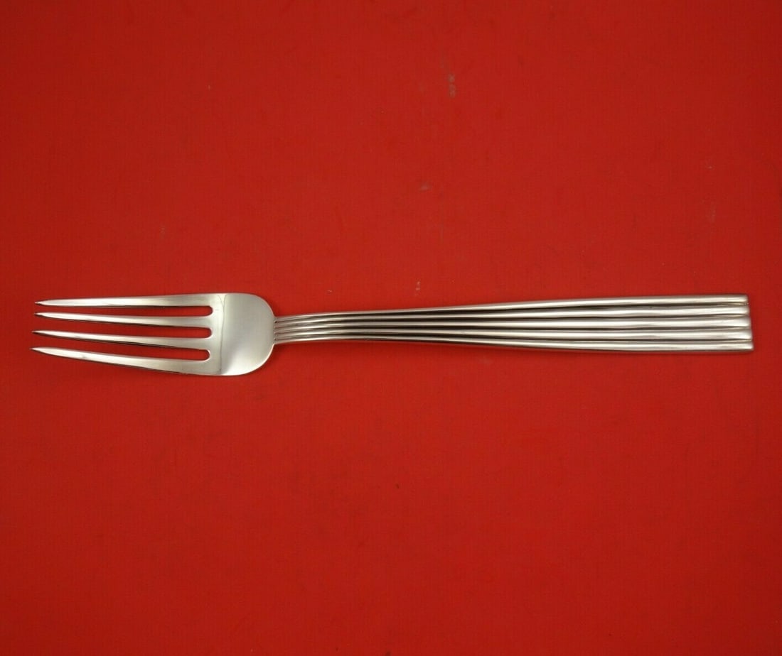 Buccellati Tiber Sterling Silver 4-Tine Serving Fork 10 3/4": Buccellati Tiber Sterling Silver 4-Tine Serving Fork 10 3/4" Elevate your dining experience with this exquisite Tiber pattern vegetable serving fork by Buccellati. Crafted from high-quality sterling s