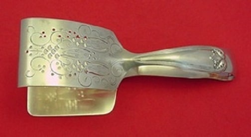 Tiffany & Co Colonial Sterling Silver Asparagus Serving Tong 7.5": Tiffany & Co Colonial Sterling Silver Asparagus Serving Tong 7.5" This exquisite serving piece is a Colonial asparagus serving tong crafted from high-quality sterling silver by Tiffany & Co.