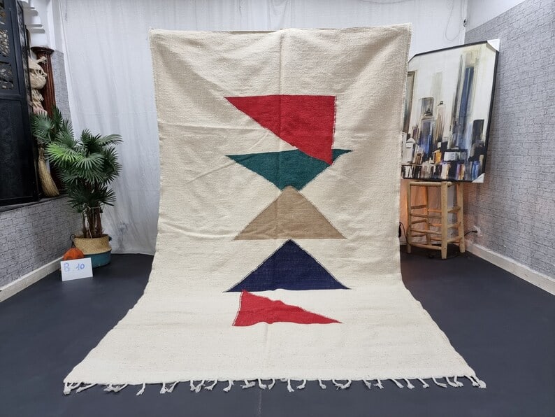 Authentic Handwoven Moroccan Rug 10 x 5 Feet Berber Wool: Authentic Handwoven Moroccan Rug 10 x 5 Feet Berber Wool Discover the charm of this Fabulous Authentic Rug, handwoven in the Atlas Mountains by skilled local Berber women weavers. Crafted with care us