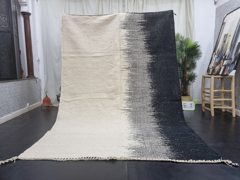 Handmade Moroccan Berber Wool Area Rug in White Grey Black 9.84 x 6.56 ft: Handmade Moroccan Berber Wool Area Rug in White Grey Black 9.84 x 6.56 ft Enhance your living space with this stunning handmade Moroccan Berber wool area rug, featuring an elegant combination of white