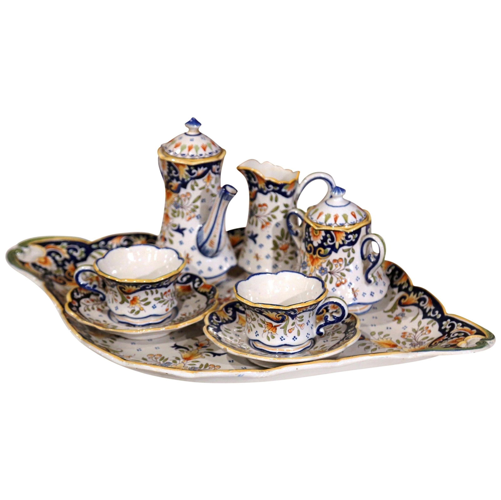 Elegant Early 20th Century French Faience Coffee Set from Blois 10 Pieces: Elegant Early 20th Century French Faience Coffee Set from Blois 10 Pieces Indulge in the elegance of this Early 20th Century French Hand Painted Faience Coffee Set from Blois, crafted around 1920. Thi