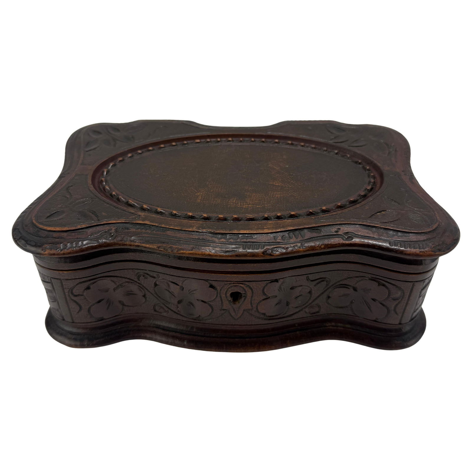 Carved Walnut Trinket Box with Floral Motifs Mid-19th Century Black Forest Style: Carved Walnut Trinket Box with Floral Motifs Mid-19th Century Black Forest Style This mid-19th century carved walnut jewelry or trinket box exemplifies the refined craftsmanship of the Black Forest tr