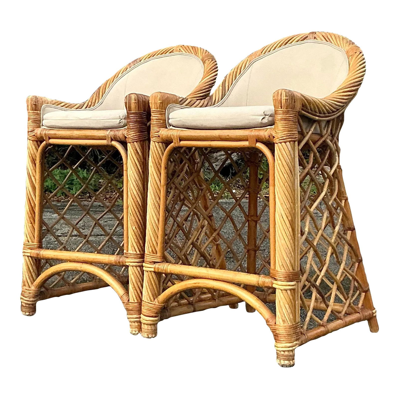 Pair of Vintage Coastal Trellis Rattan Bar Stools 41" Tall: Pair of Vintage Coastal Trellis Rattan Bar Stools 41" Tall Elevate your bar or kitchen decor with this stunning pair of Vintage Coastal Trellis Rattan Bar Stools. These stools feature intricately wove