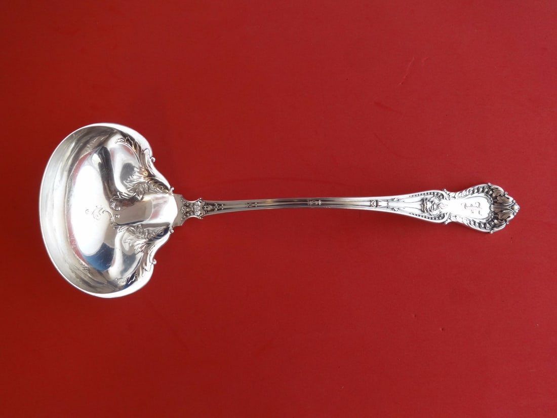 Whiting Dorothy Vernon Sterling Silver 10 1/4" Oyster Ladle: Whiting Dorothy Vernon Sterling Silver 10 1/4" Oyster Ladle This exquisite oyster ladle, crafted by Whiting, features the elegant Dorothy Vernon pattern. Measuring 10 1/4 inches in length, it is made