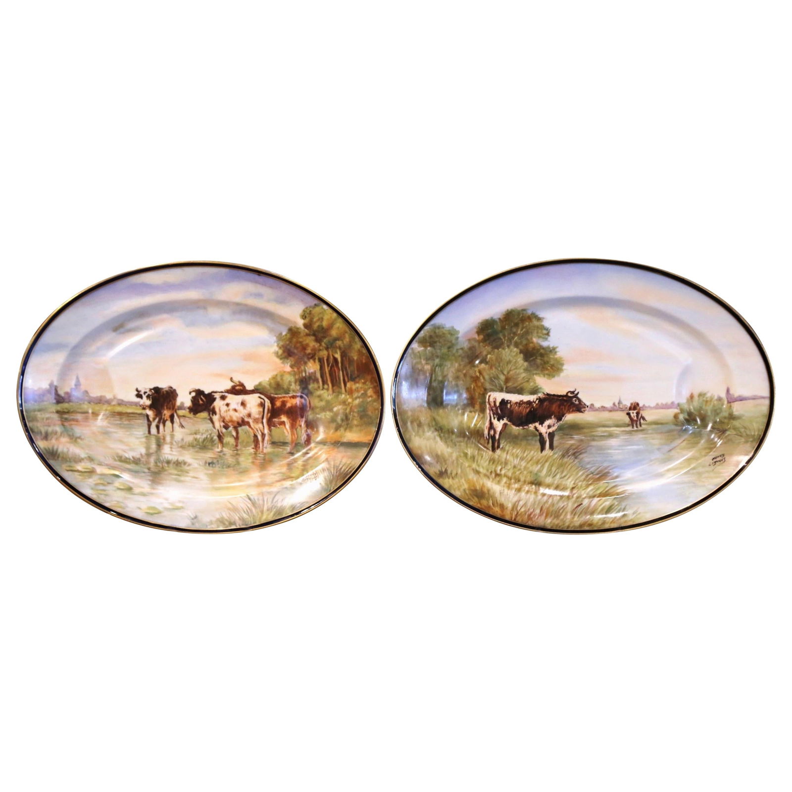 Set of 2 Antique 19th Century Limoges Hand-Painted Cows Wall Platters: Set of 2 Antique 19th Century Limoges Hand-Painted Cows Wall Platters Enhance your decor with this stunning pair of 19th Century French Limoges painted porcelain wall platters. Crafted in Limoges, Fra