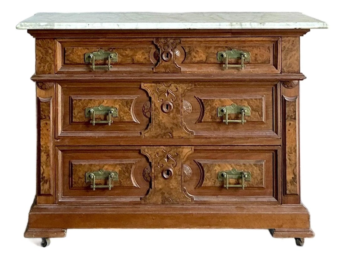 Burl Wood and Marble Eastlake Chest with Ornate Brass Pulls: Burl Wood and Marble Eastlake Chest with Ornate Brass Pulls This vintage Boho Eastlake chest of drawers is a detailed revival piece inspired by the Baroque and Rococo periods, crafted for the mid-20th